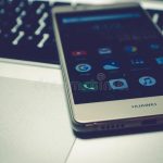 mobile-phone-laptop-top-keyboard-84961481